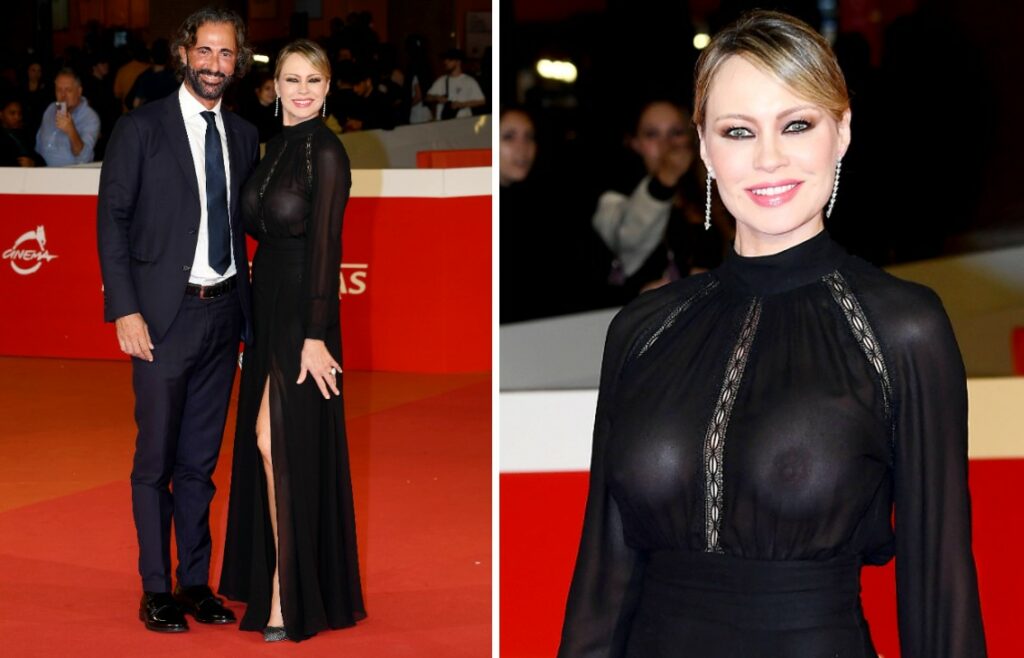 Anna Falchi sul red carpet col nuovo compagno e senza reggiseno: foto