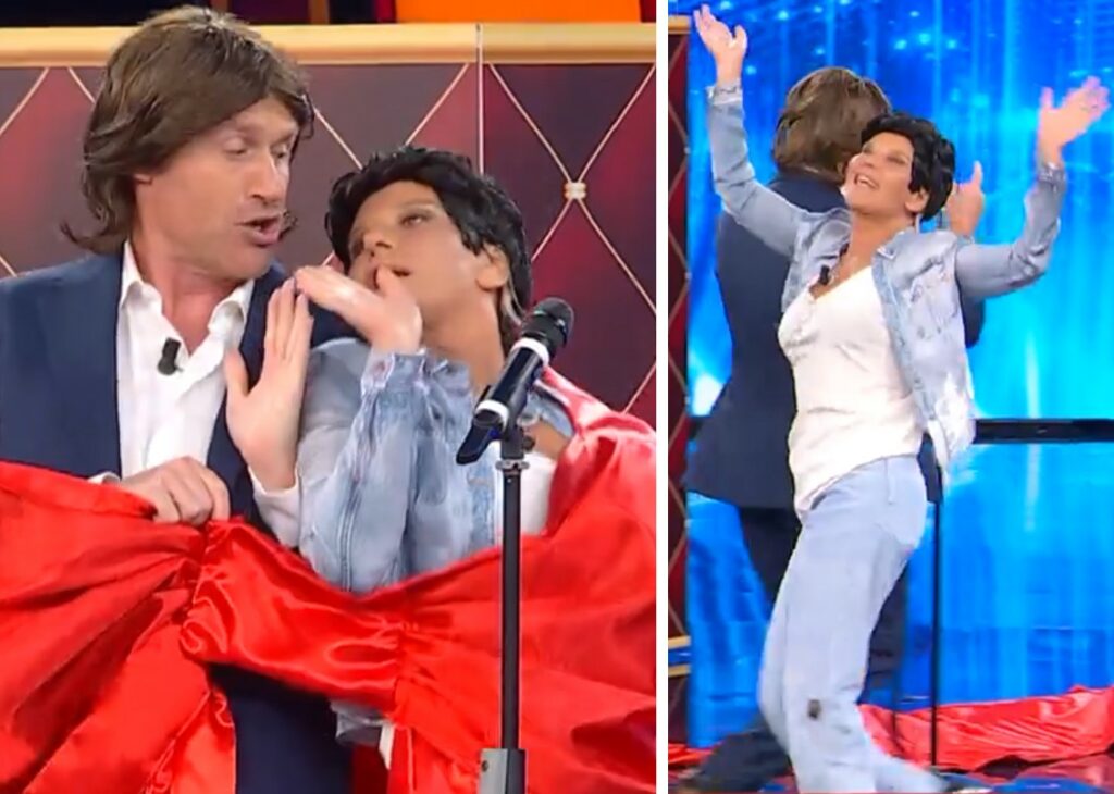 Maria De Filippi si trasforma in Angela Brambati dei 'Ricchi e Poveri' sul palco tra parrucca, balli e mossette: il pubblico esplode dalle risate Maria De Filippi si trasforma in Angela Brambati dei 'Ricchi e Poveri' sul palco tra parrucca, balli e mossette: il pubblico esplode dalle risate